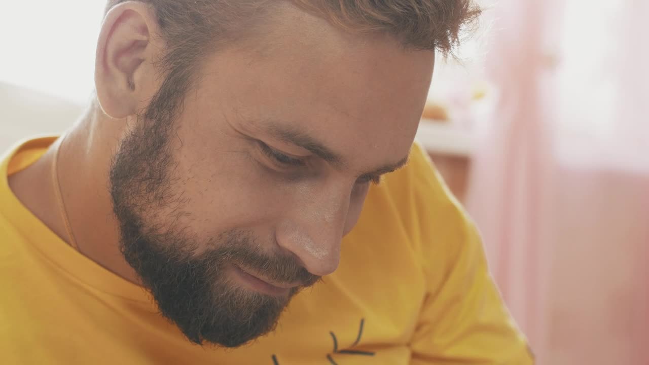 Stock Video Father With A Short Beard Next To His Baby Live Wallpaper For PC