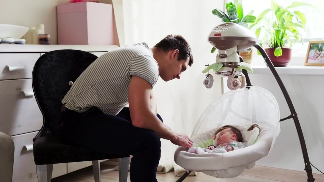 Stock Video Father Watching His Newborn Child Sleep Live Wallpaper For PC