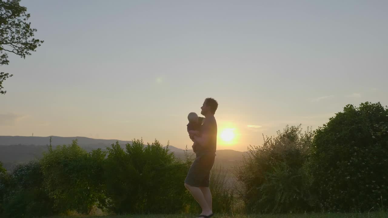 Stock Video Father Holding His Son Outside Live Wallpaper For PC