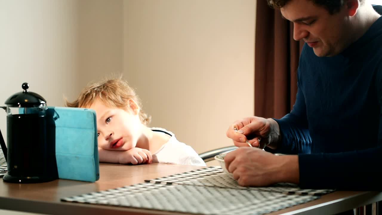 Stock Video Father Feeding His Young Son Live Wallpaper For PC