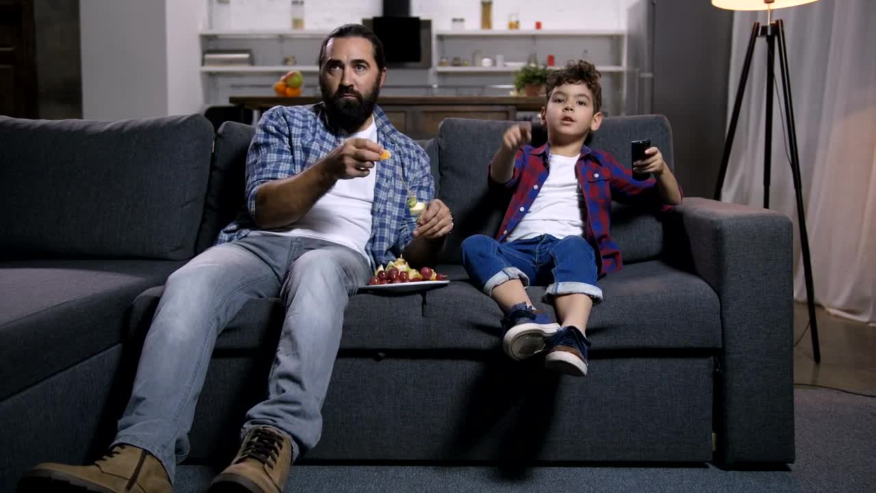 Stock Video Father And Son Watching A Film Live Wallpaper For PC