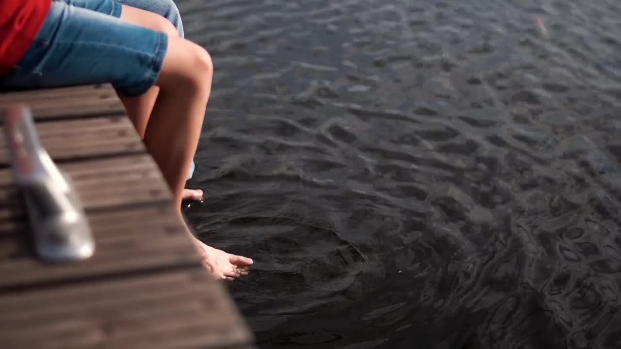 Stock Video Father And Son Sitting On The Pier Live Wallpaper For PC