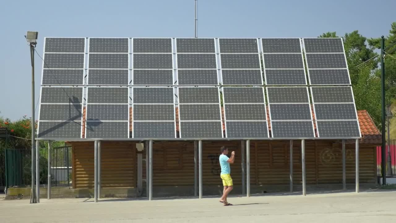 Stock Video Father And Son By A Solar Array Live Wallpaper For PC