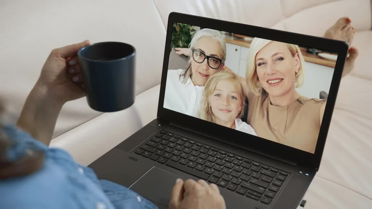 Stock Video Family Waves Hello To Woman On Laptop Video Call Live Wallpaper For PC