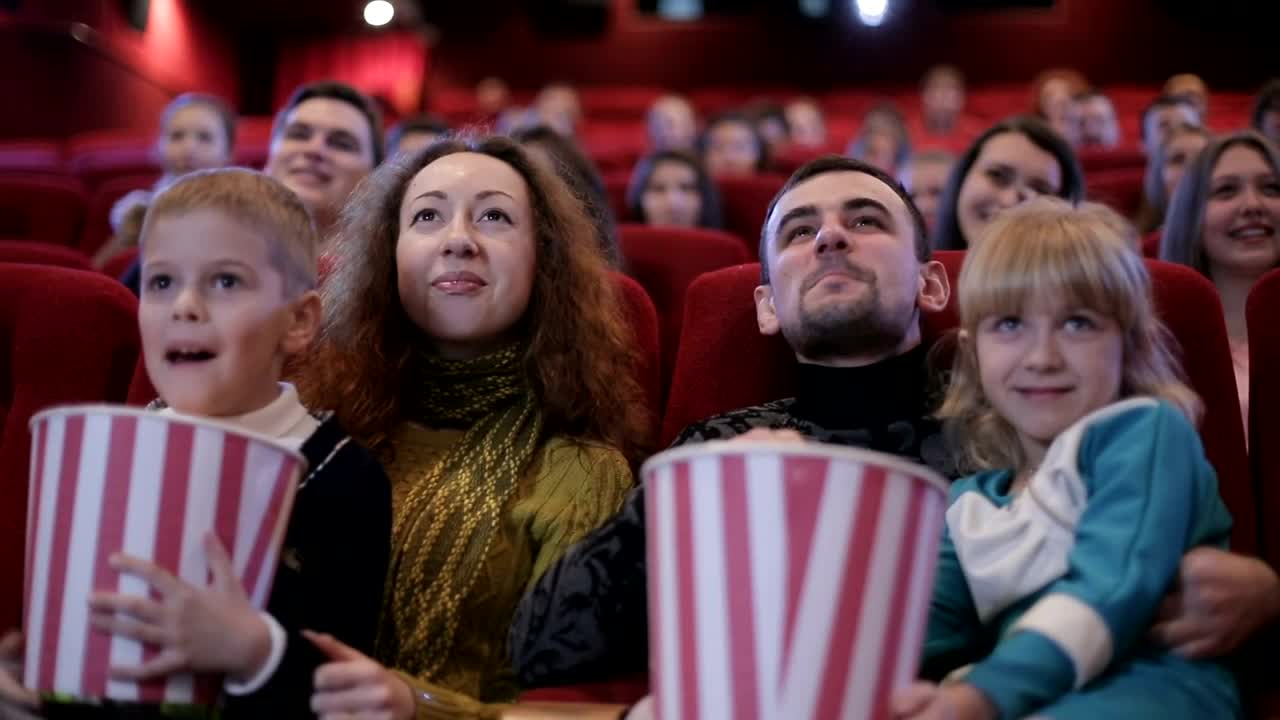 Stock Video Family Watching A Movie At The Cinema Live Wallpaper For PC