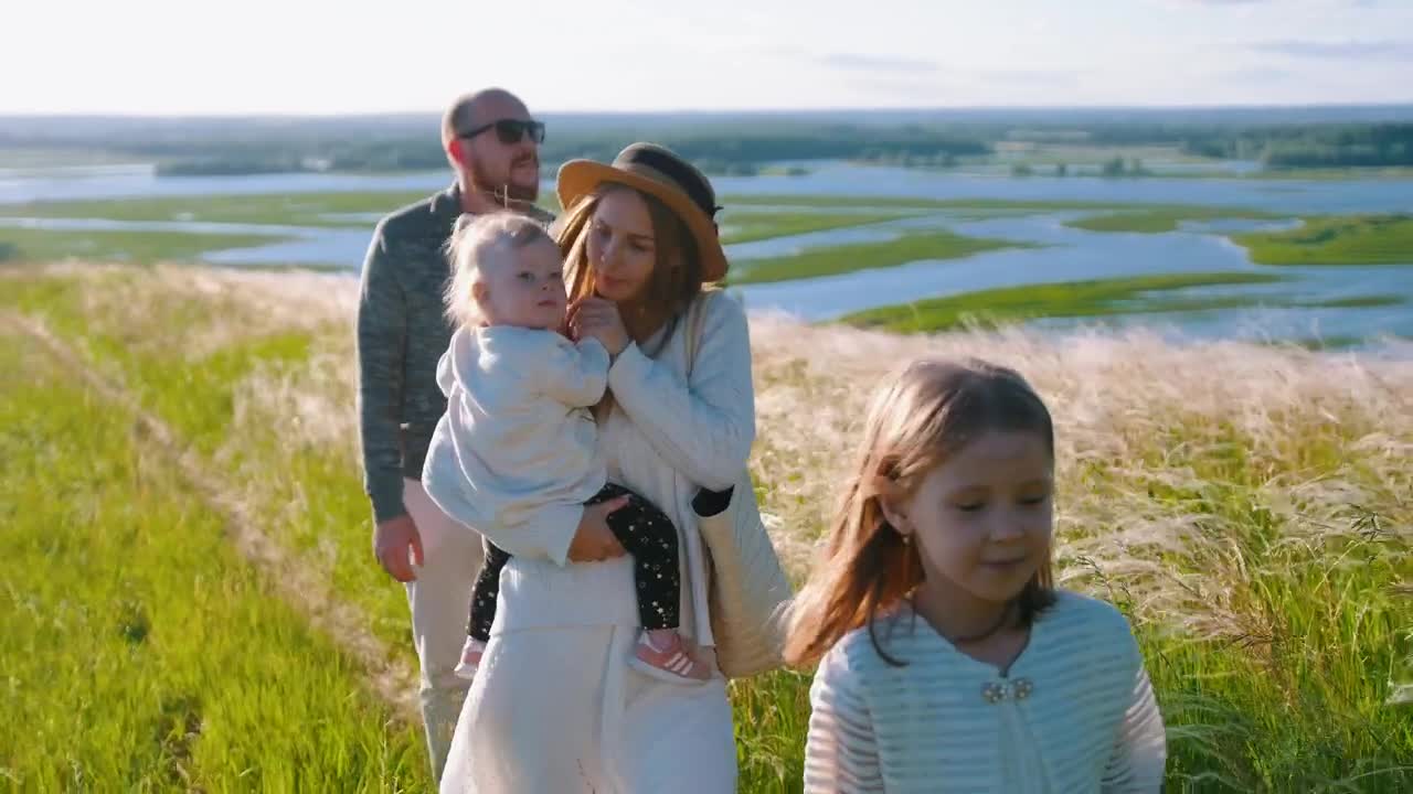 Stock Video Family Walking In A Path In The Meadow Live Wallpaper For PC