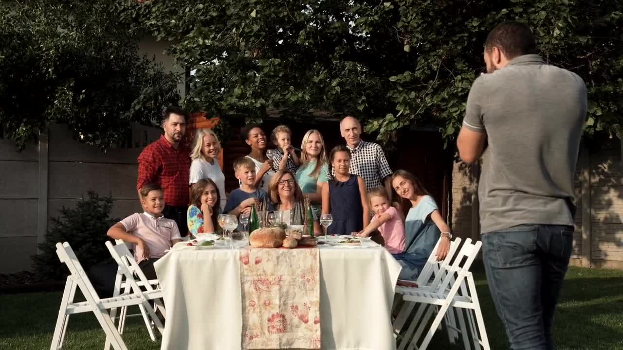 Stock Video Family Taking A Group Photo In The Garden Live Wallpaper For PC