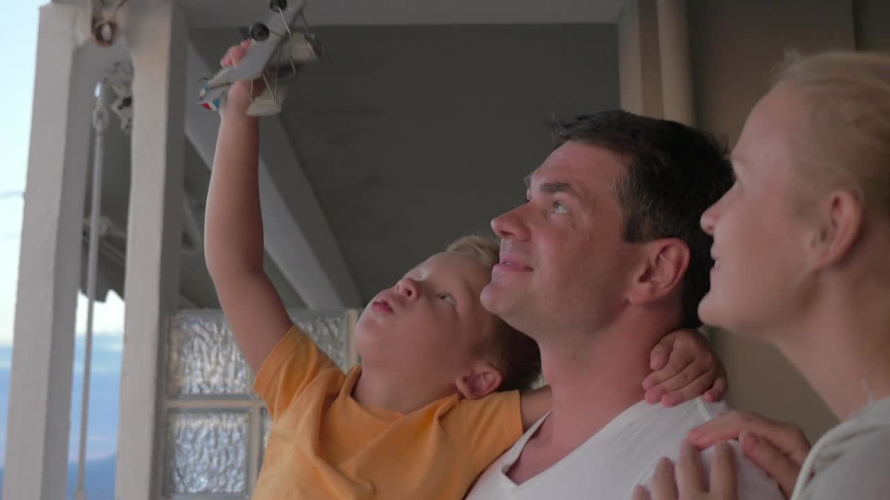 Stock Video Family Standing On A Hotel Balcony Live Wallpaper For PC