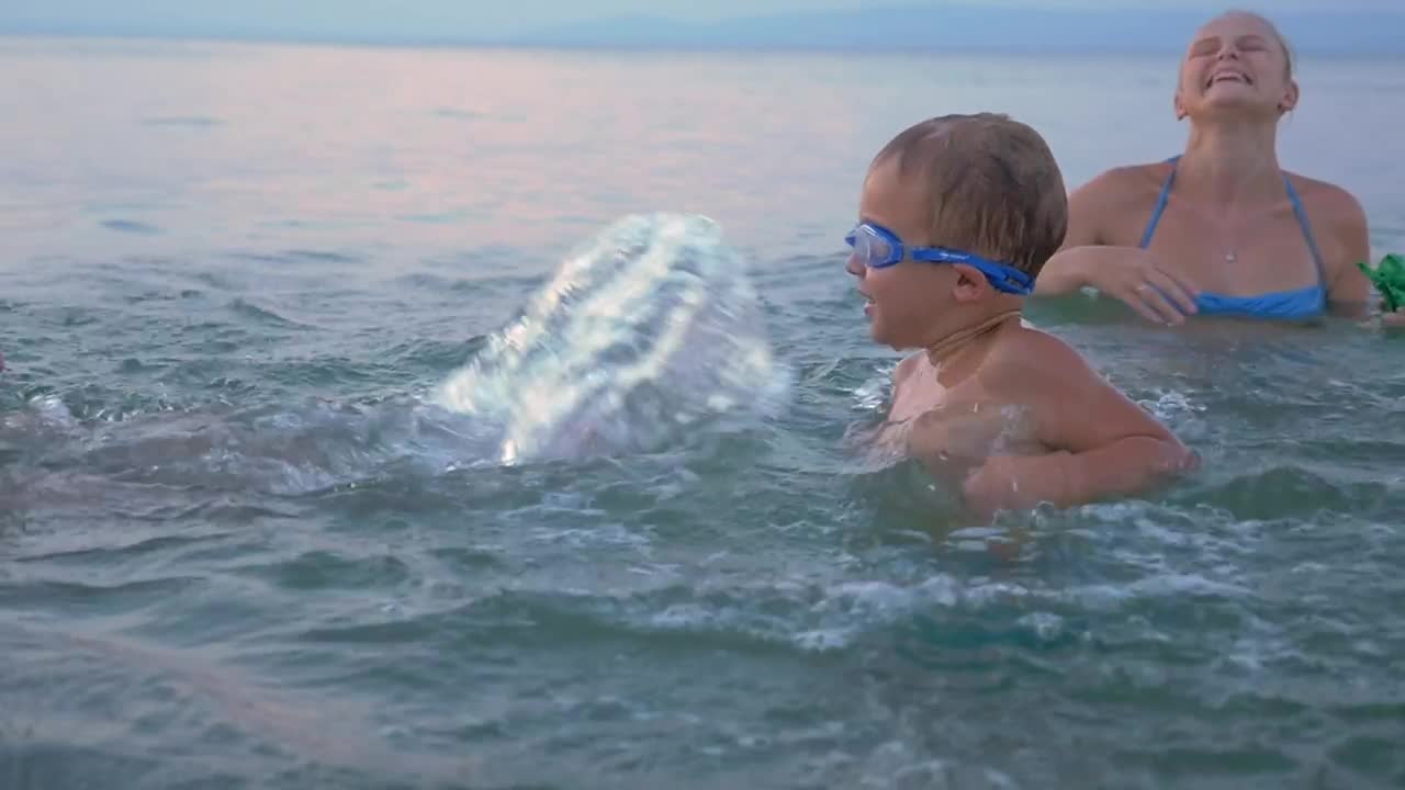 Stock Video Family Splashing In The Ocean Live Wallpaper For PC