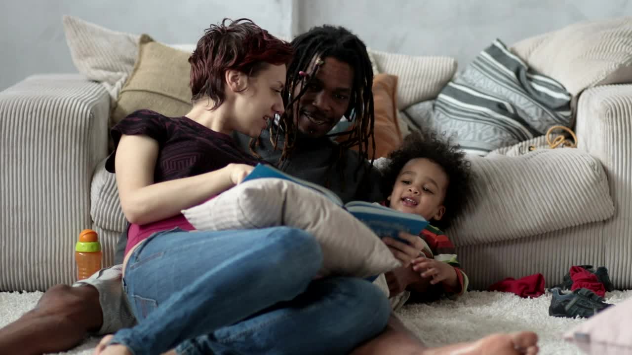Stock Video Family Reading A Story On The Floor Live Wallpaper For PC