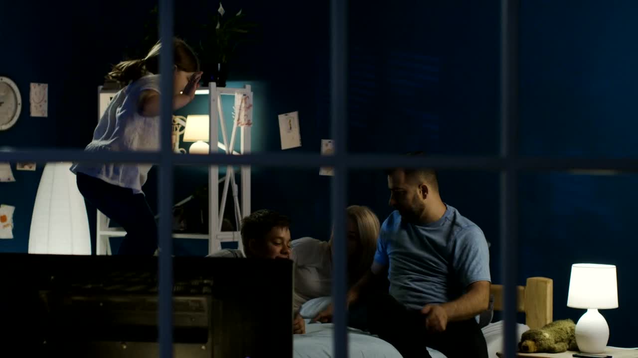 Stock Video Family Prepares To Watch Netflix In The Bedroom Live Wallpaper For PC