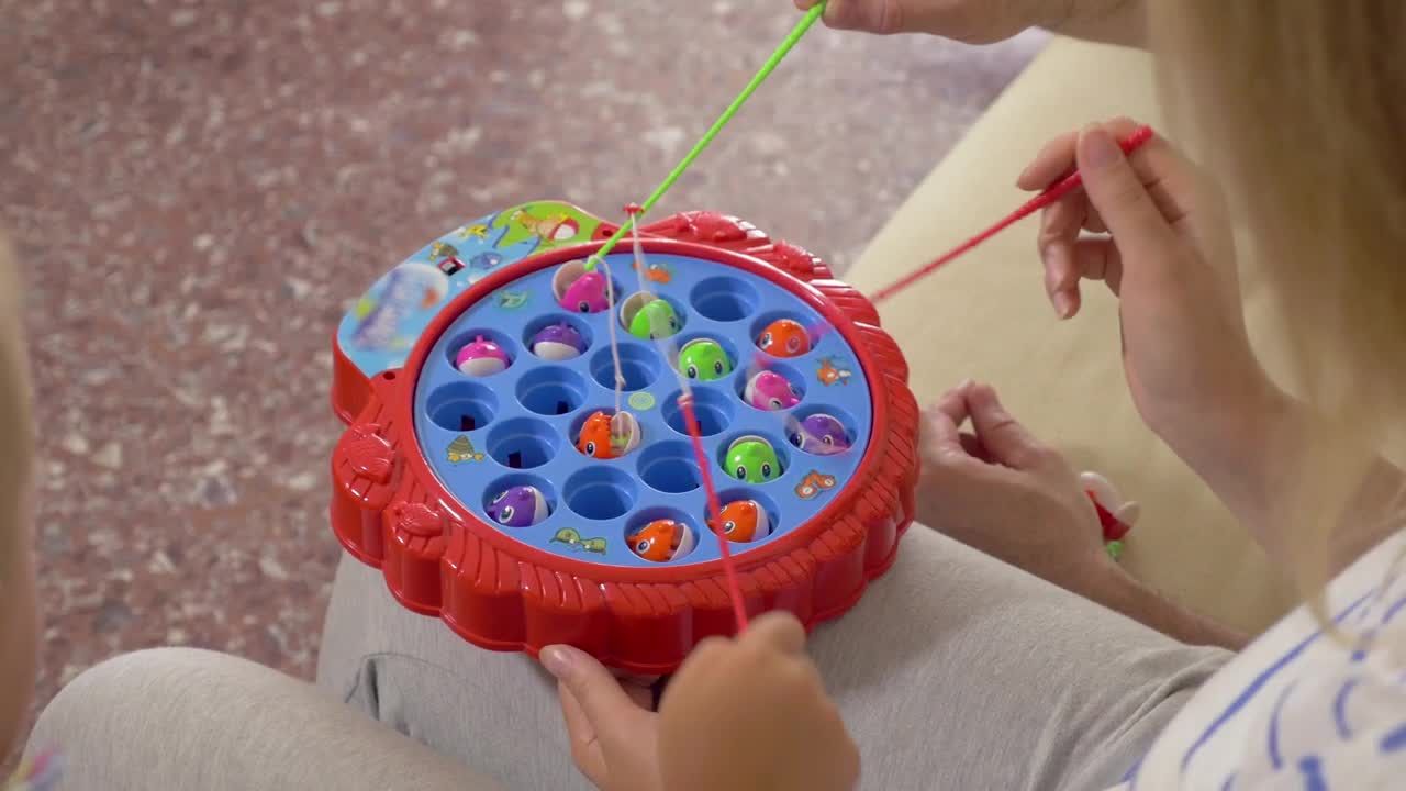 Stock Video Family Playing A Fishing Game Live Wallpaper For PC