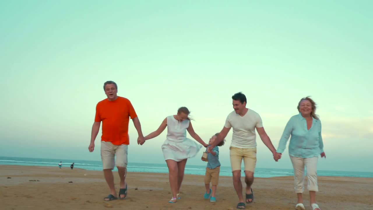 Stock Video Family Holding Hands At The Beach Live Wallpaper For PC