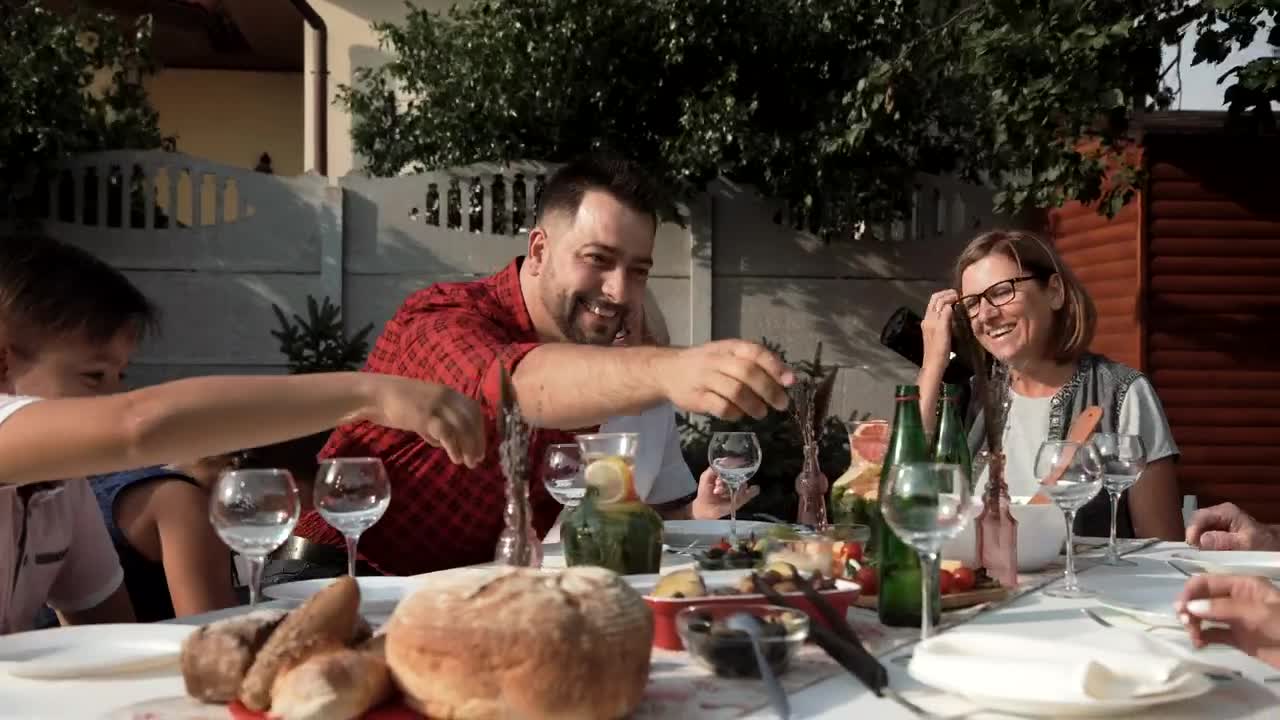 Stock Video Family Having A Fancy Dinner Outdoors Live Wallpaper For PC