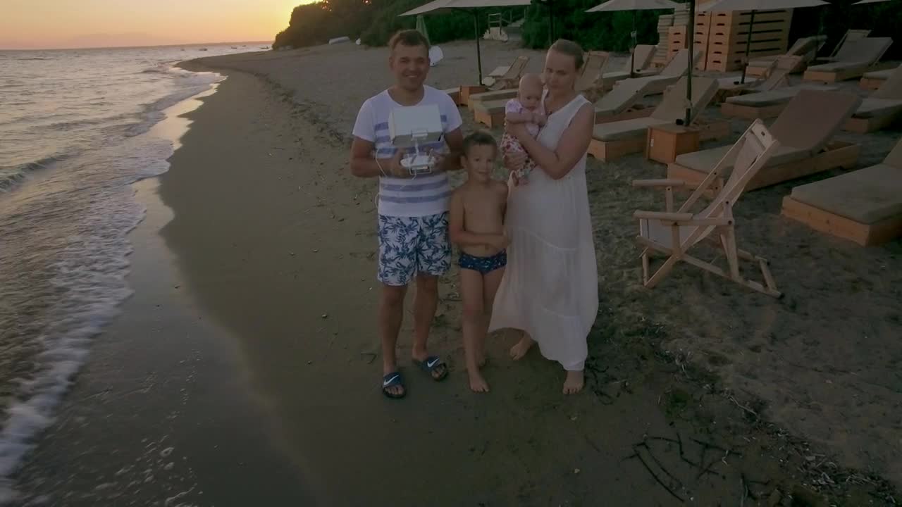 Stock Video Family Flying A Drone At The Beach Live Wallpaper For PC