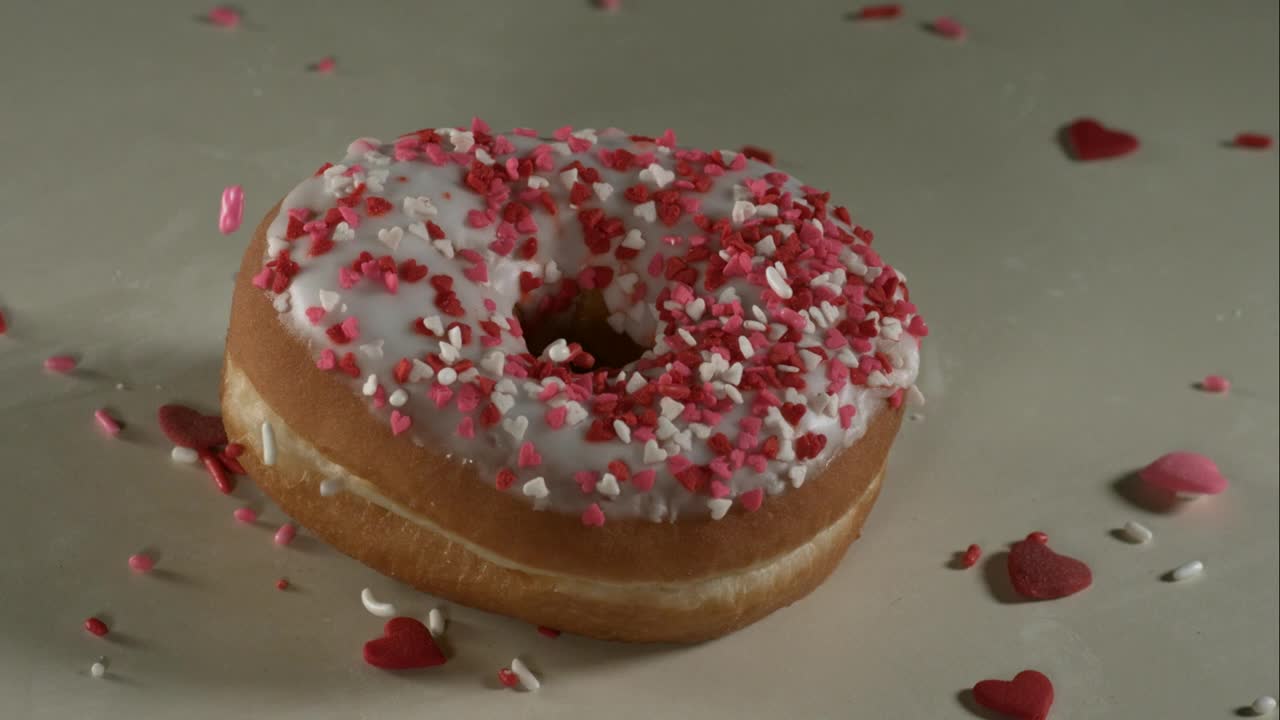 Stock Video Falling Sweet Decorations Into The Doughnut Live Wallpaper For PC