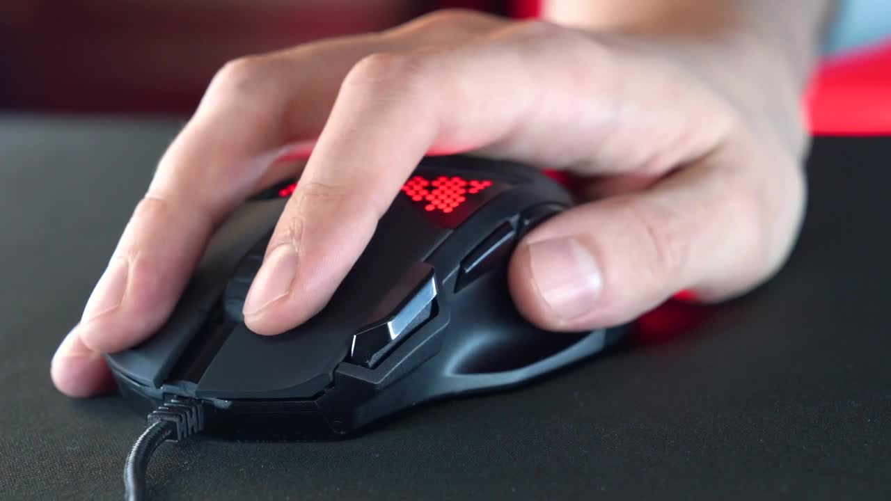 Stock Video Hand Using A Gaming Mouse With Rgb Neon Lightings Live Wallpaper For PC