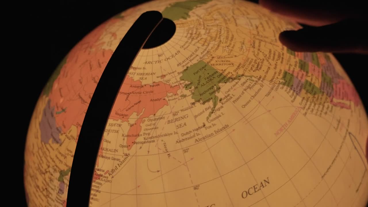Stock Video Hand Turning A Luminous Earth Globe In The Dark Live Wallpaper For PC