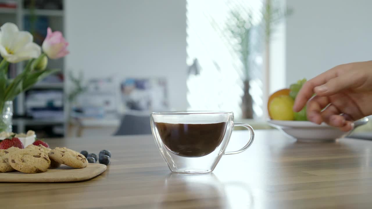 Stock Video Hand Takes Cup Of Coffee From The Table Live Wallpaper For PC