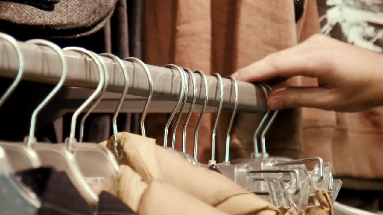 Stock Video Hand Selecting Through Clothes Live Wallpaper For PC