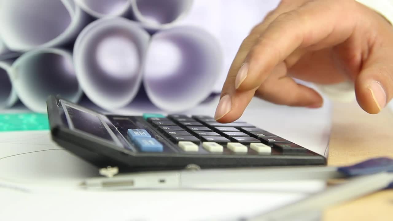 Stock Video Hand Of An Engineer On A Calculator Live Wallpaper For PC