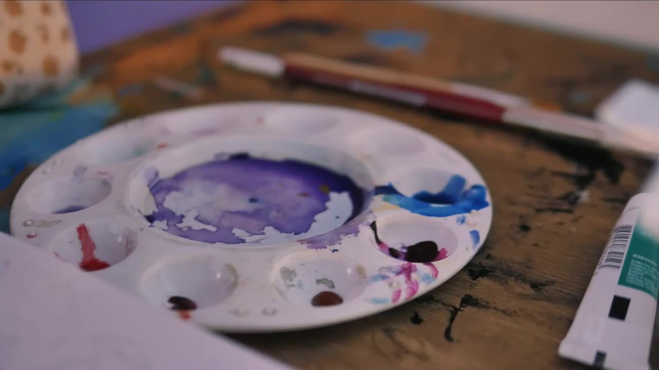 Stock Video Hand Of An Artist Girl Painting With A Brush Live Wallpaper For PC