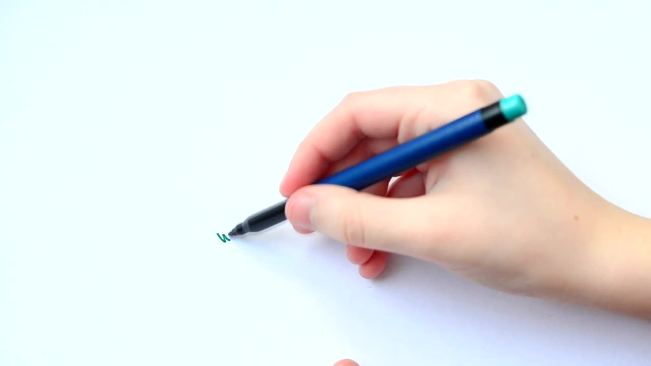 Stock Video Hand Of A Young Person Drawing A Family Live Wallpaper For PC