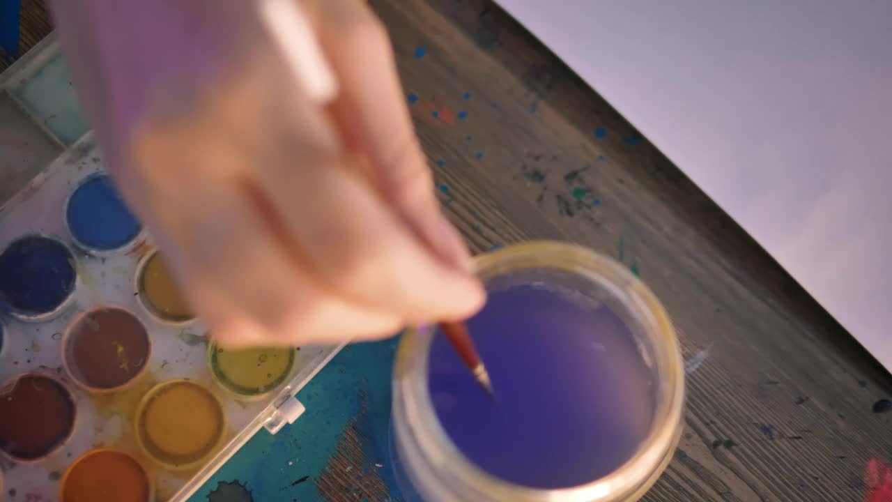 Stock Video Hand Of A Woman Painting With Watercolors Live Wallpaper For PC