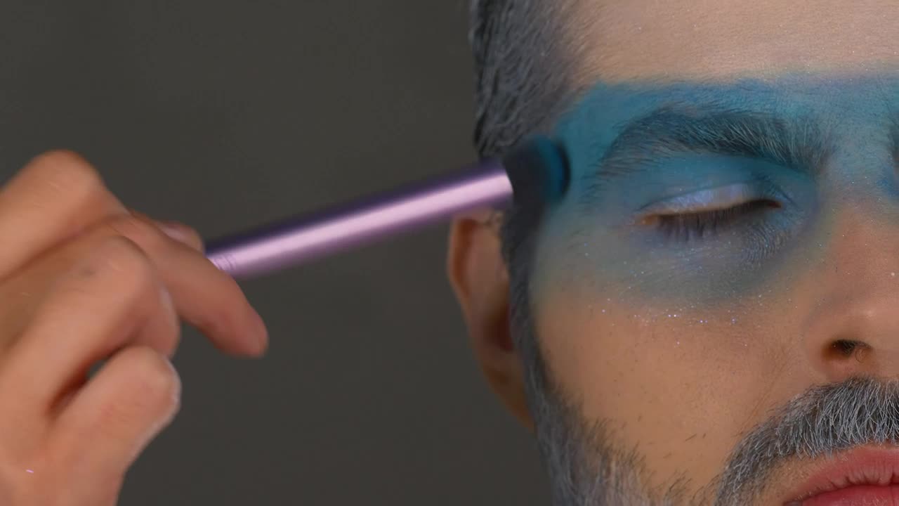 Stock Video Hand Of A Woman Making Up The Look Of A Live Wallpaper For PC