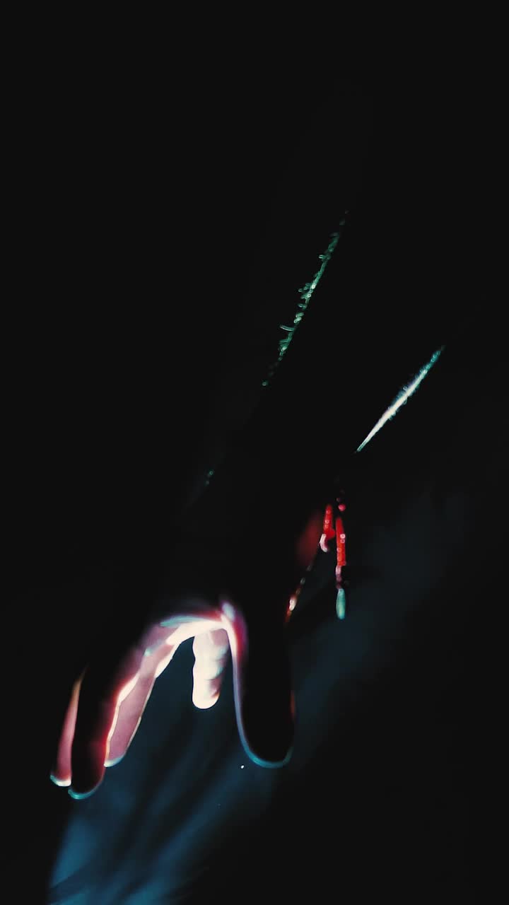 Stock Video Hand Of A Person Illuminated In The Dark Live Wallpaper For PC