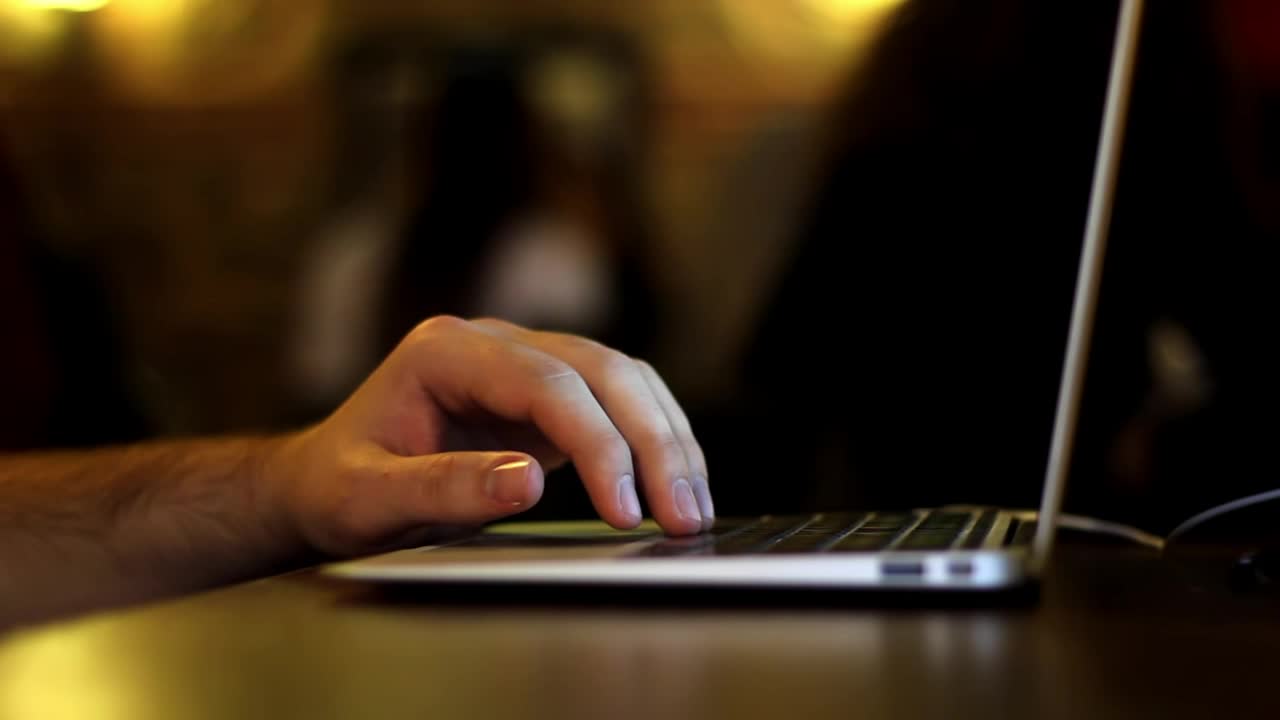 Stock Video Hand Of A Man Typing On A Laptop Live Wallpaper For PC
