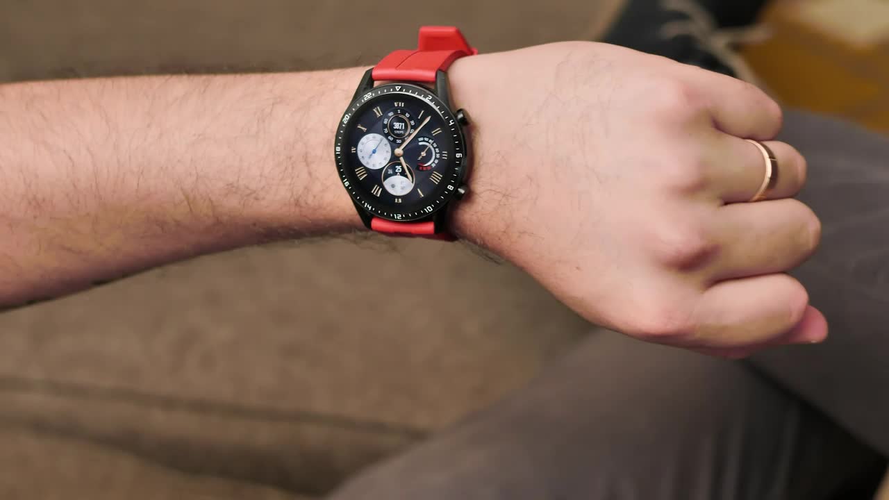 Stock Video Hand Of A Man Looking At His Smart Watch Live Wallpaper For PC