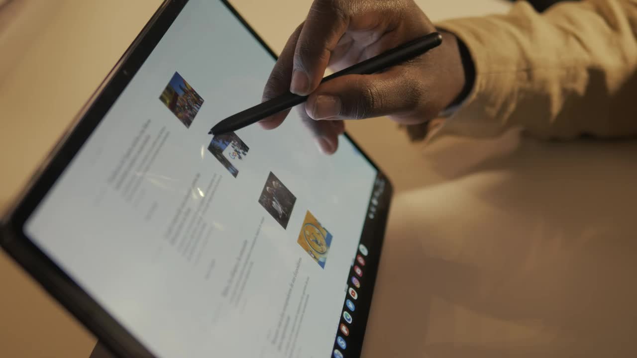 Stock Video Hand Of A Man Browsing The Internet On A Tablet Live Wallpaper For PC