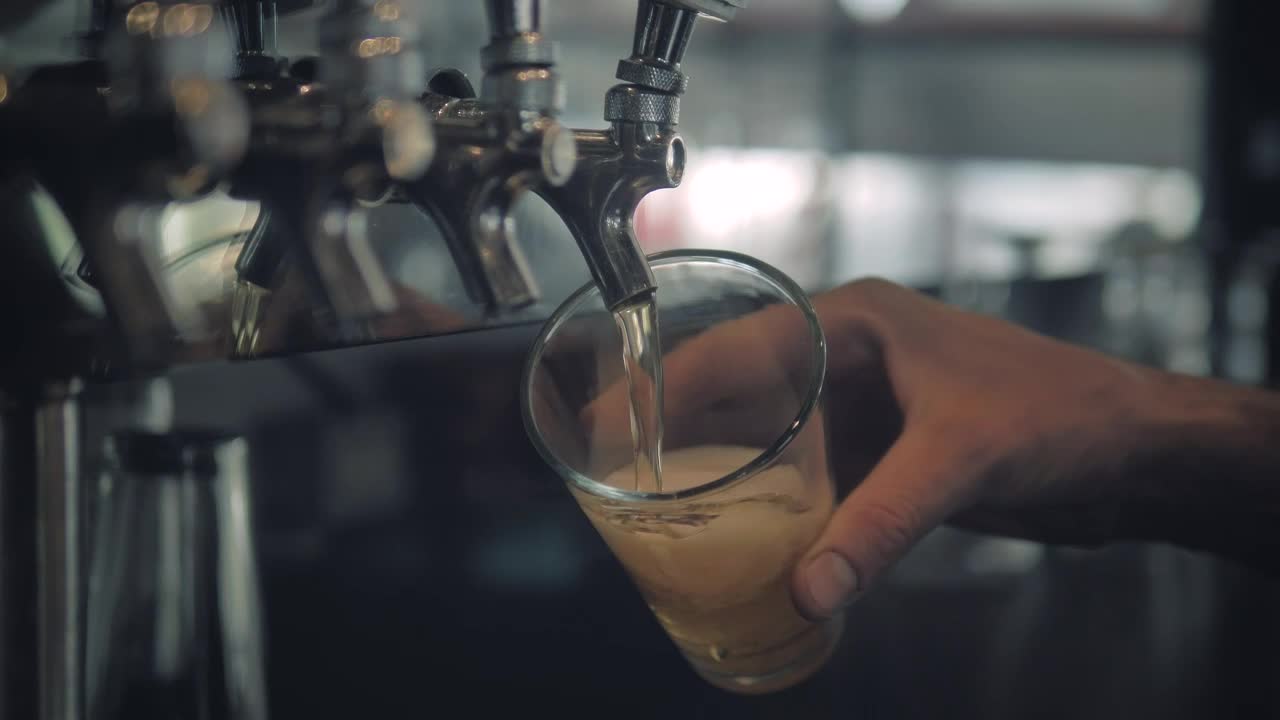 Stock Video Hand Of A Bartender Serving Beer Live Wallpaper For PC