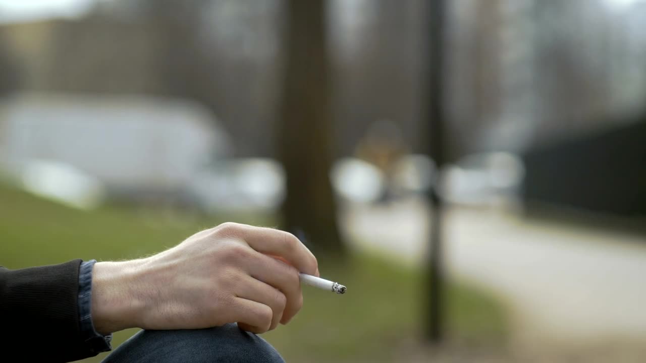 Stock Video Hand Holding A Cigarette Live Wallpaper For PC