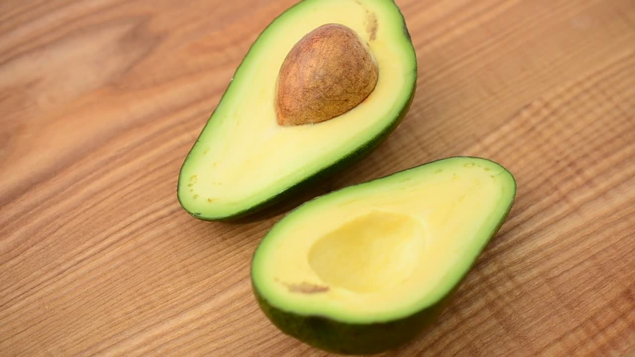 Stock Video Halved Avocado On A Table Live Wallpaper For PC