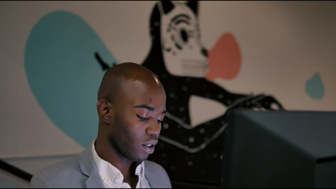 Stock Video Hairless Man Working At The Office Live Wallpaper For PC