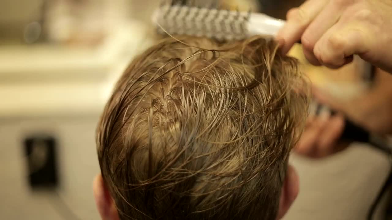 Stock Video Hairdresser Combing A Client Live Wallpaper For PC