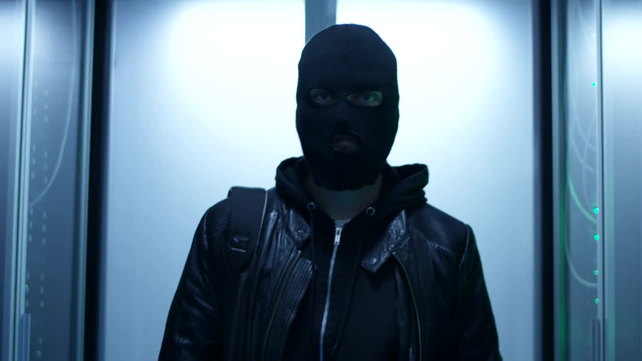 Stock Video Hacker With Face Mask Entering Data Center Live Wallpaper For PC