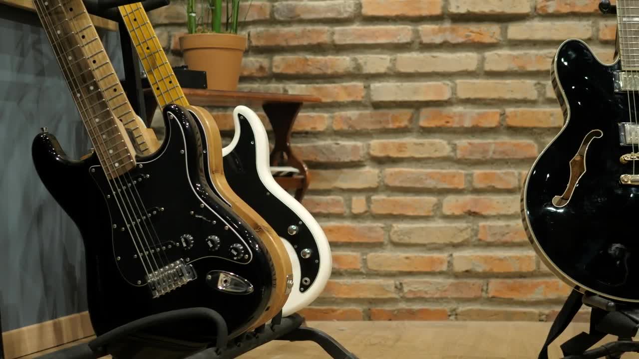 Stock Video Guitarist Takes An Electric Acoustic Guitar Live Wallpaper For PC