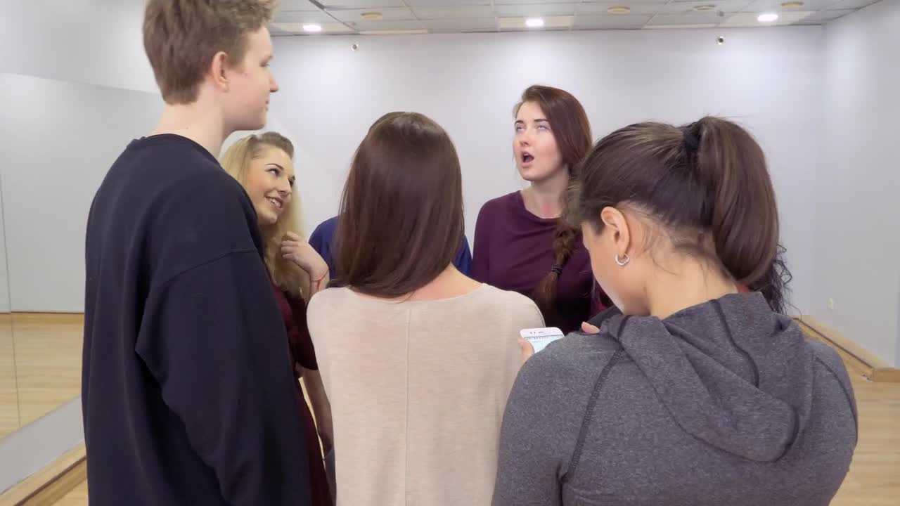 Stock Video Group Of Young People Talking About Their Presentation Live Wallpaper For PC