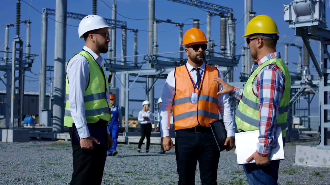 Stock Video Group Of Workers In An Electrical Plant Live Wallpaper For PC