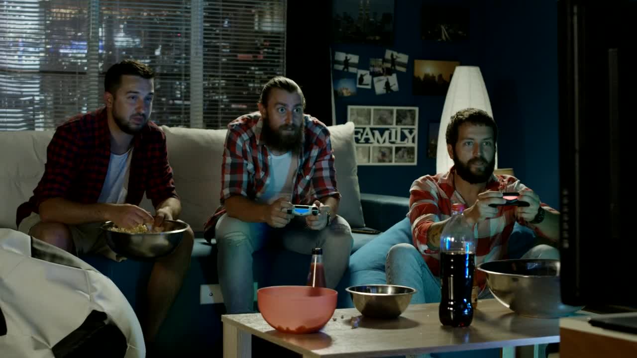 Stock Video Group Of Men Playing Video Games At Home Live Wallpaper For PC