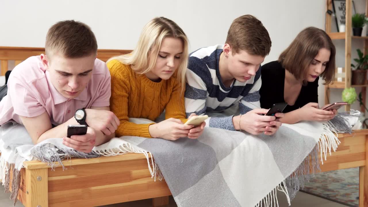 Stock Video Group Of Friends Glued To Their Phones Live Wallpaper For PC