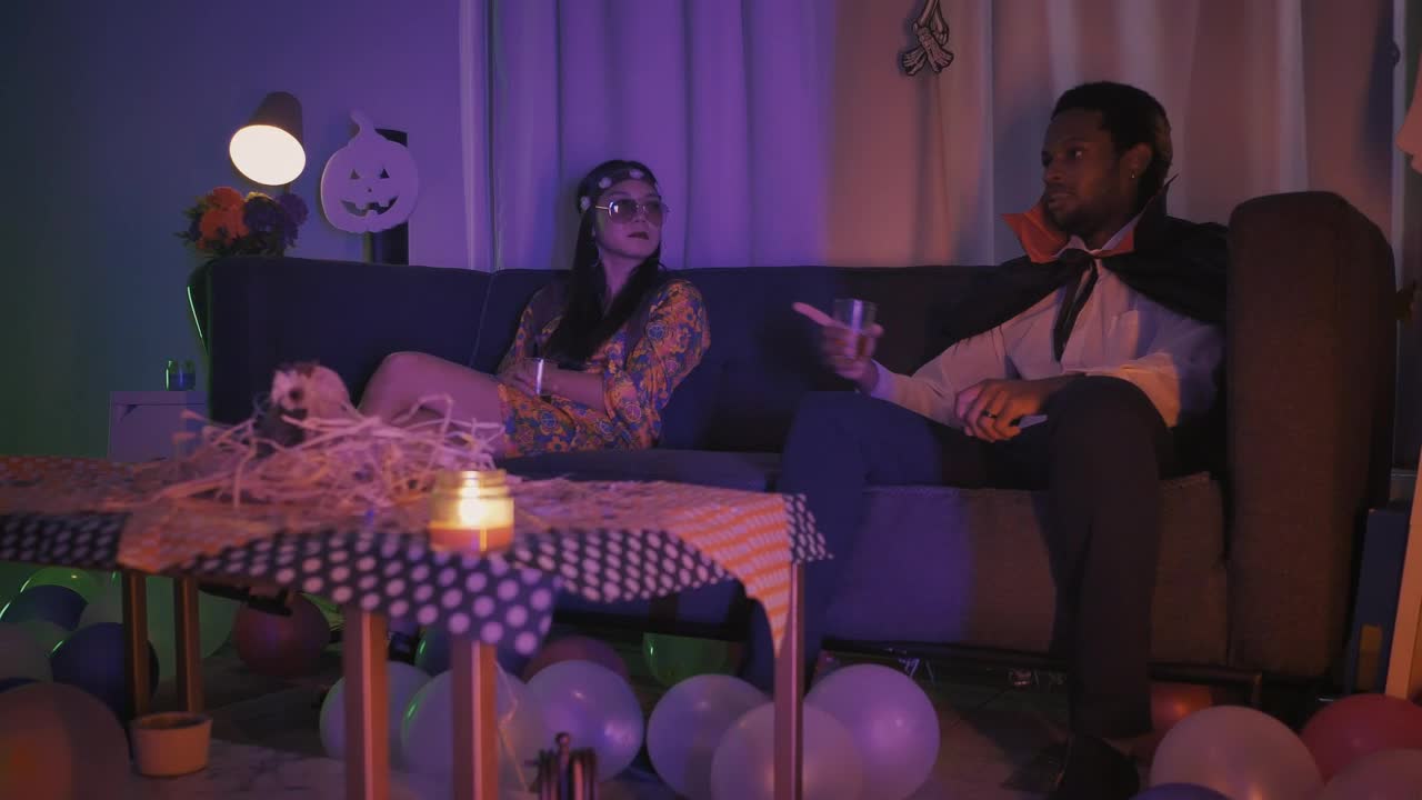 Stock Video Group Of Friends Chatting At A Halloween Costume Gathering Live Wallpaper For PC