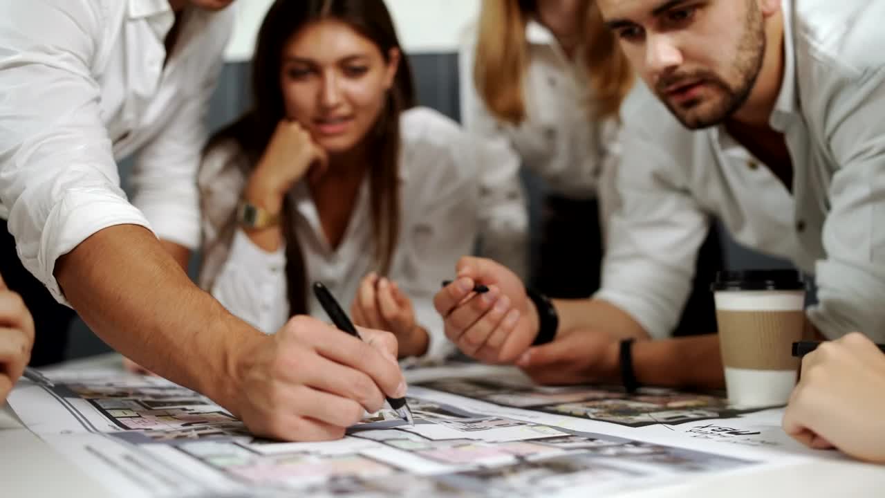 Stock Video Group Of Architects Discussing A Project Live Wallpaper For PC