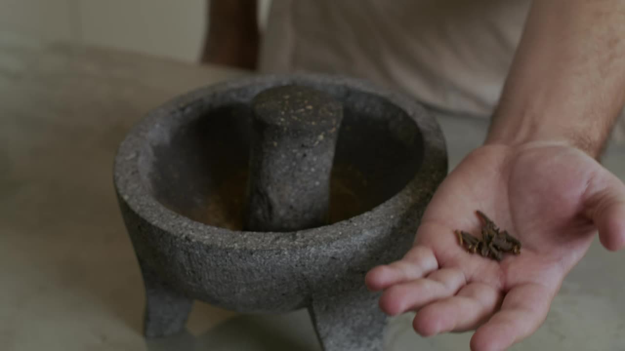 Stock Video Grinding Cinnamon In A Molcajete Live Wallpaper For PC
