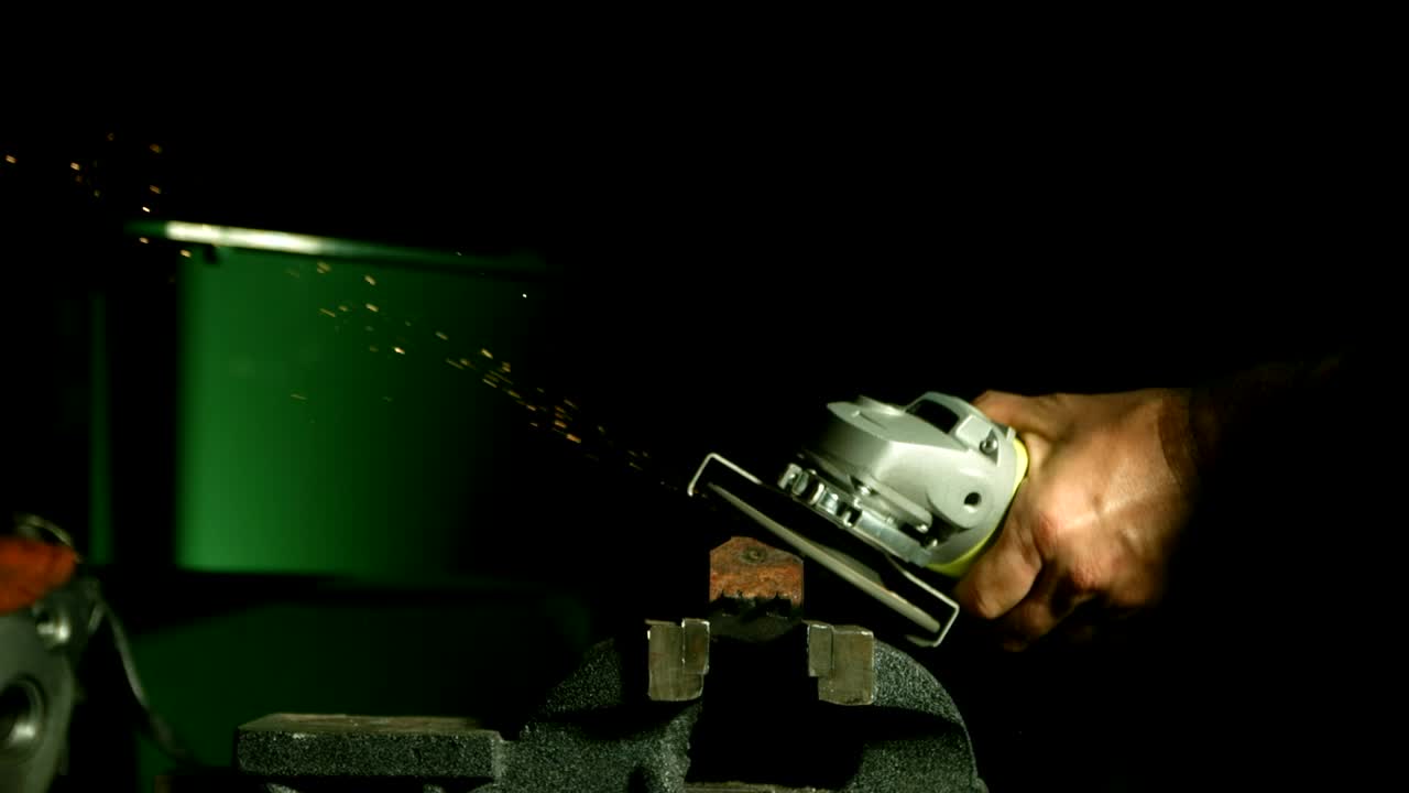 Stock Video Grinder Tool Creating Sparks In The Darkroom Live Wallpaper For PC