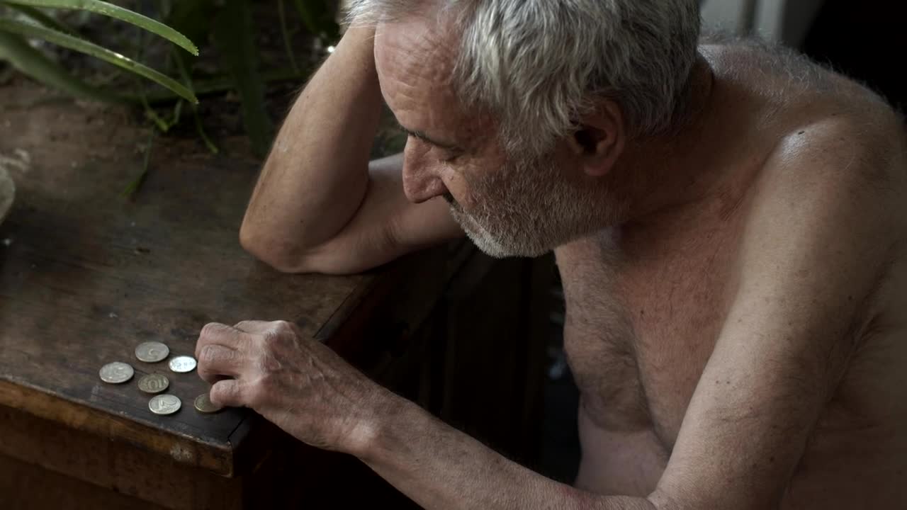 Stock Video Gray Haired Old Man Counting A Few Coins Live Wallpaper For PC