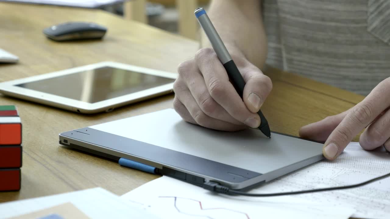 Stock Video Graphic Designer Working With A Graphic Tablet Live Wallpaper For PC